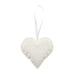 heart shaped pouch containing lavender in a light cream lace print 