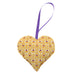 Heart shaped pouch filled with lavender in a gold and purple Thistle print