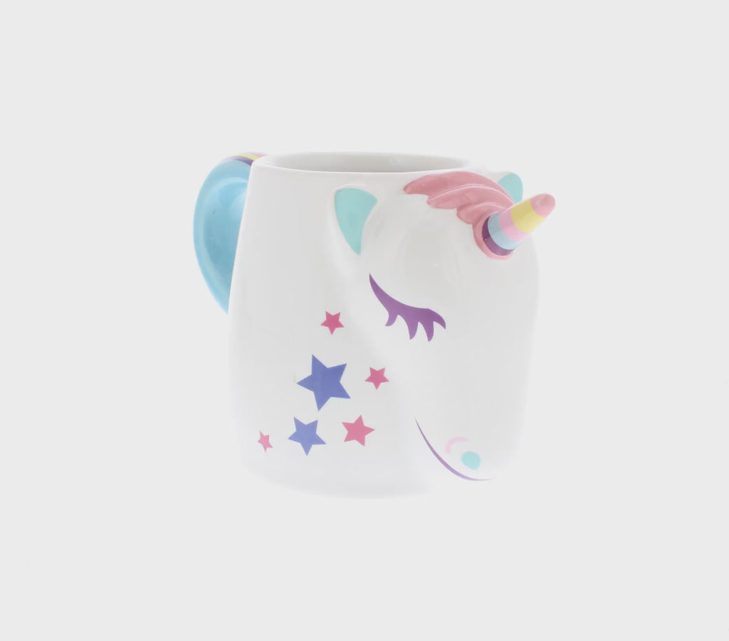 360 rotating view of unicorn coffee mug which has unicorn horn shaped head and with rainbow handle