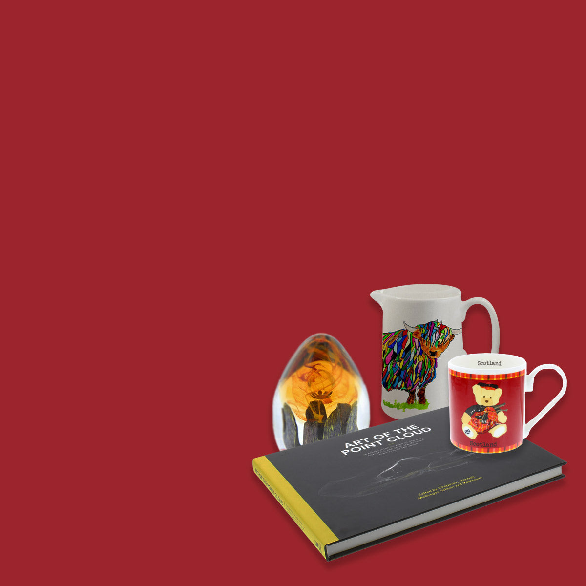 red background indicating sale with small selection of products shown including art of the point cloud book, piper bear mug, highland cow jug and outlander paperweight