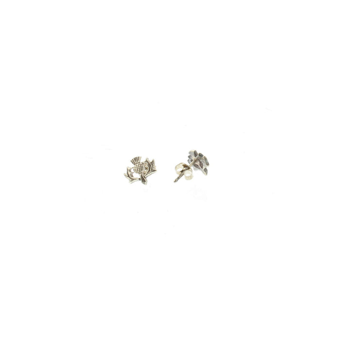 silver stud thistle shaped earrings shown out of box on white background