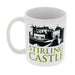 white ceramic stirling castle coffee mug with green text and black and white illustration of castle