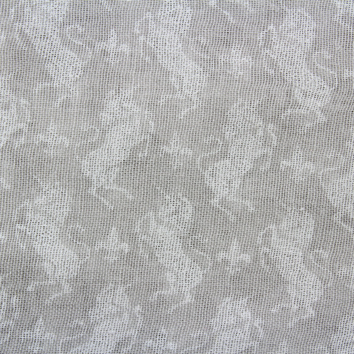 Close up detail of the unicorn pattern on the Stirling Castle Unicorn Scarf