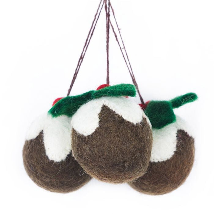 Three felted Christmas pudding ornaments hanging on a branch against a white background. - Image