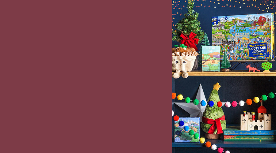 Decorative shelf with Christmas-themed items including a small plush tree, jigsaw, and colorful decorations. - Image