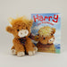 Plush toy of a Highland cow next to a book titled 'Harry the Highlander' on a white background - Image