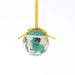 A round ceramic Christmas ornament featuring a light blue and white map design with illustrations of historic castles and the text 'STIRLING CASTLE', hanging from a yellow ribbon on a white background. - Image