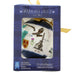 Urquhart Castle Loch Ness Christmas decoration in its original blue packaging box, featuring a printed illustration of the Scottish landscape and castle on a white ceramic-style ornament visible through a clear window. - Image