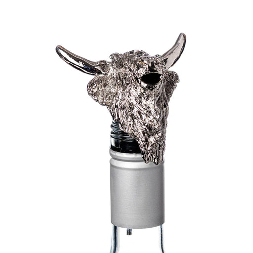 decorative Highland Cow bottle pourer against a white background.  - Image