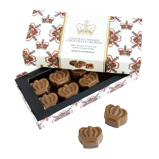 Box of Golden Caramel Chocolate Crowns with decorative packaging on a white background - Image