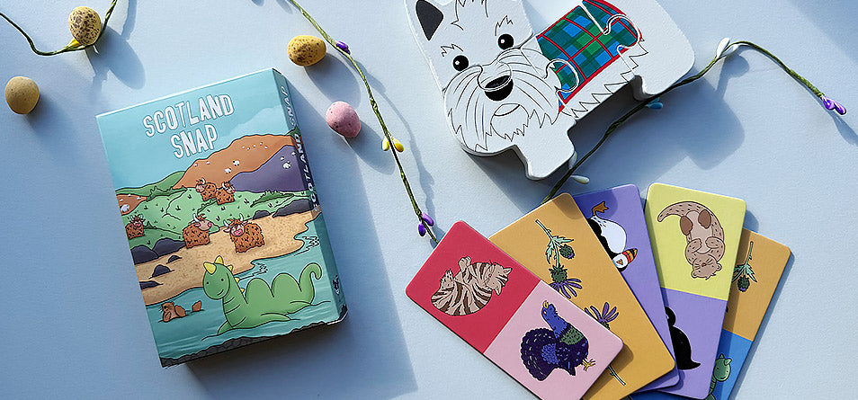 Set of colorful illustrated cards on a blue surface with decorative elements. - Image