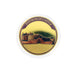 Edinburgh Castle coin with gold color and dark red border on a white background - Image
