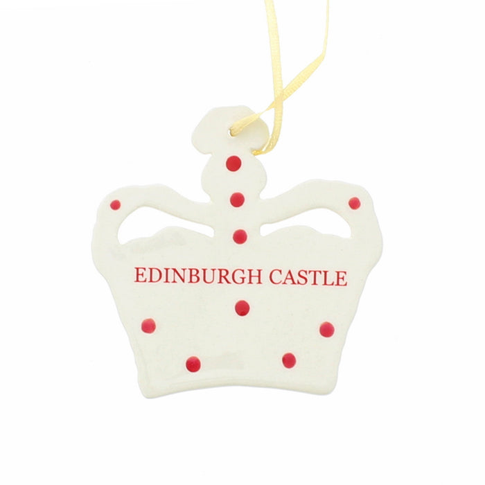 Back of a white ceramic decoration in the shape of a crown that reads Edinburgh Castle.  - Image