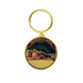 Gold hardware coin keyring with a red and gold embossed design of Edinburgh Castle - Image