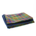 Folded tartan scarf with blue fleece on a white background - Image