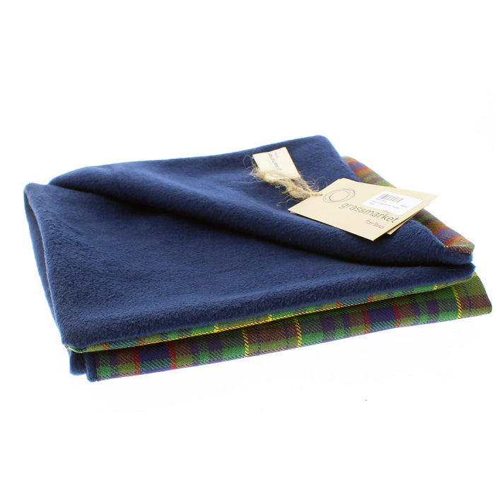 Folded tartan scarf showing the blue fleece side.   - Image