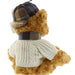 Teddy bear wearing an arran sweater and tweed hat on a white background - Image