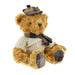 Teddy bear wearing an arran sweater, scarf, and tartan hat on a white background - Image