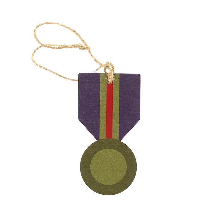 A medal shaped wooden hanging decoration with a natural jute hanging string. - Image