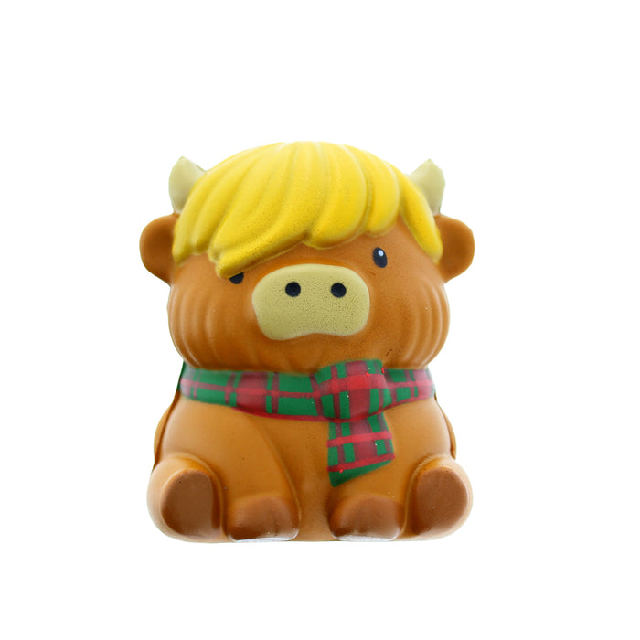 Stress sqriushy toy in the shape of Highland Cow wearing a tartan scarf - Image