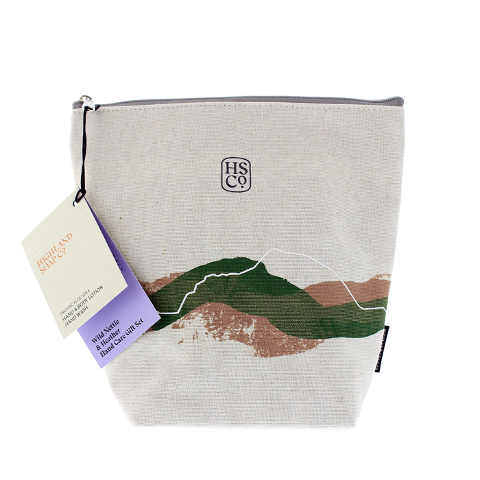 Canvas pouch with mountain design and HSCo logo on a white background - Image