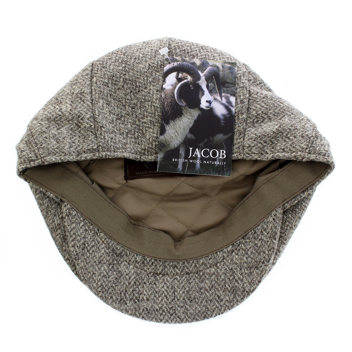 Harris Tweed cap with a label on a white background - Image
