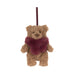 A small brown teddy bear decoration with a fuzzy dark burgundy scarf and a matching hanging ribbon, shown against a plain white background. - Image