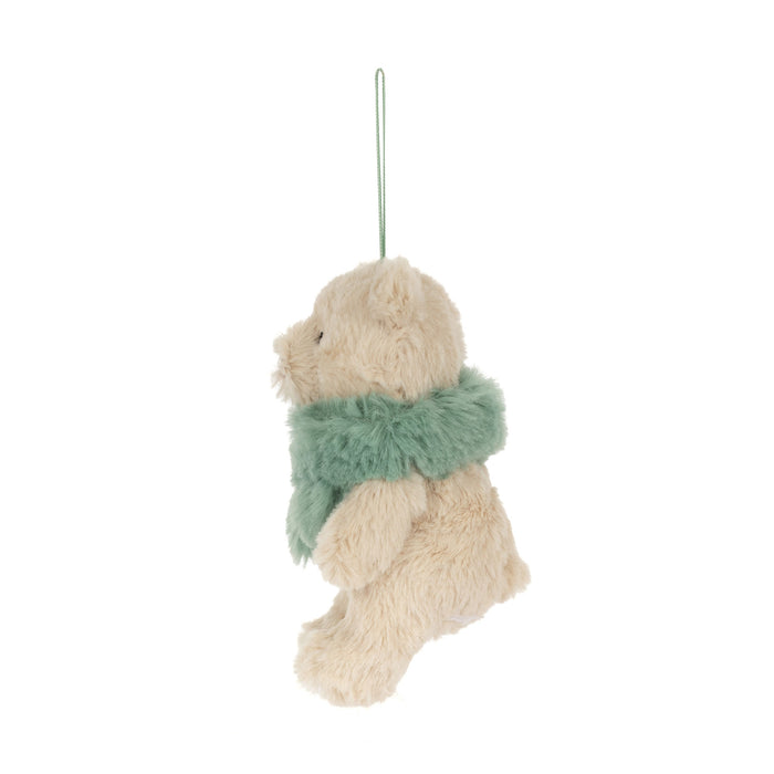 A small plush teddy bear hanging decoration in cream with a fuzzy mint green scarf, suspended by a thin green string against a plain white background. - Image