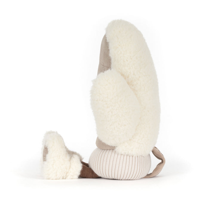 Plush soft toy in the shape of a winter mitten with smiley face, cuffed edge and fluffy feet.  - Image