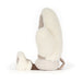Plush soft toy in the shape of a winter mitten with smiley face, cuffed edge and fluffy feet.  - Image