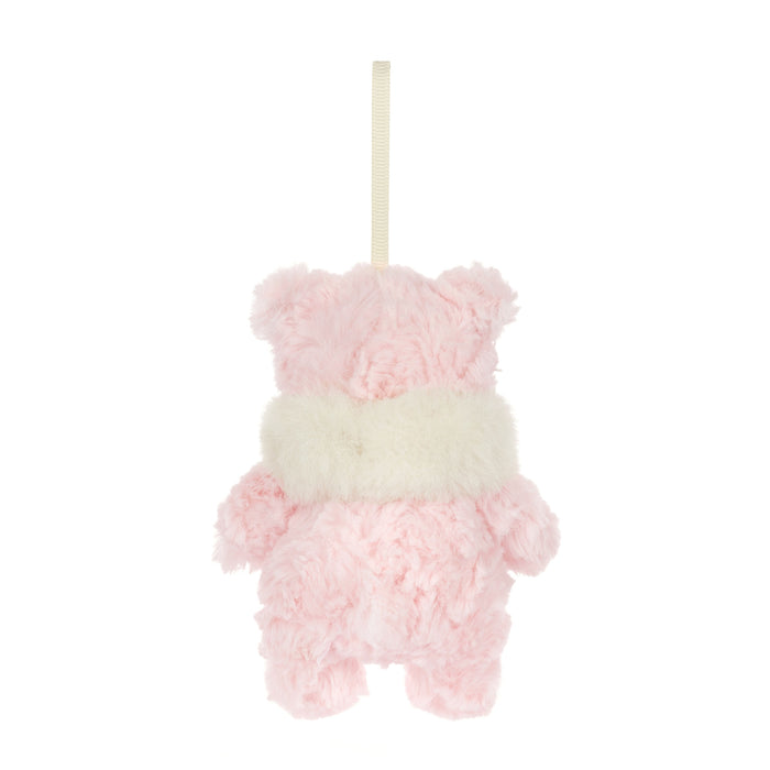 A small plush teddy bear decoration in soft pink fur with a fluffy cream scarf and a hanging loop at the top, shown on a plain white background. - Image