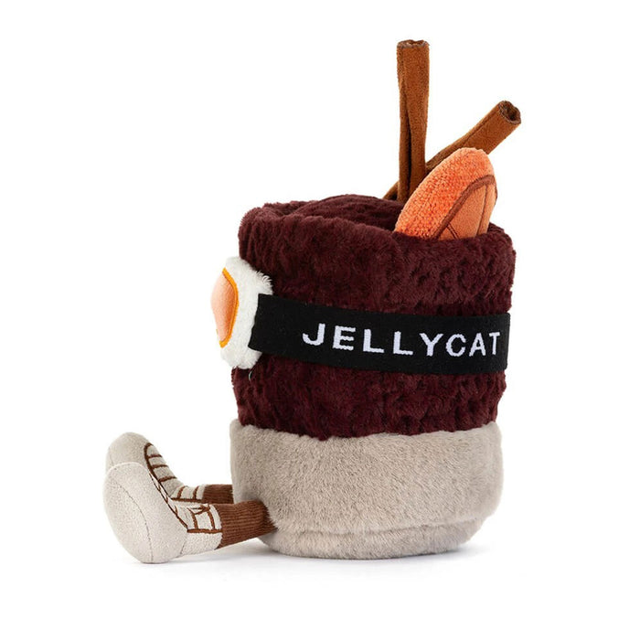 A Jellycat plush toy shaped like a mug featuring a dark burgundy top, a beige bottom, a black band with the white JELLYCAT logo photographed on a white background. - Image