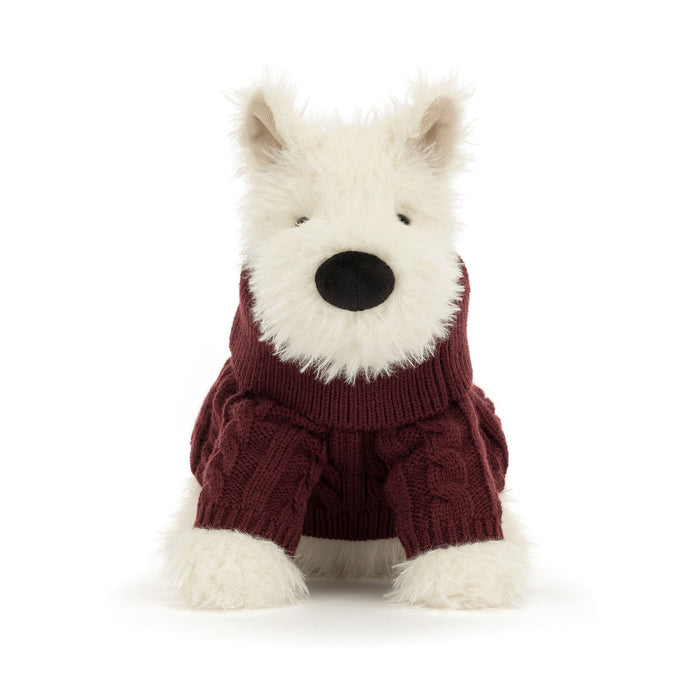 Plush White Scottie dog soft toy wearing a burgundy Aran sweater against a white backdrop.  - Image