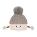 soft toy Pomilly Aran hat with winter gloves and smiley face.  - Image