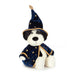 A plush dog toy dressed as a wizard, featuring a navy blue velvet robe and pointed hat with gold star patterns and trim, set against a plain white background. - Image
