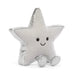 A silver glittery star-shaped plush toy with a smiling embroidered face and small feet, photographed on a clean white background. - Image