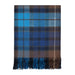 A folded plaid blanket with fringed edges, featuring a pattern of blue, brown, and black tartan on a white background. - Image