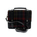 Black bag with Edinburgh castle tartan, handle and strap on a white background.  - Image