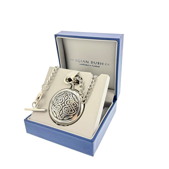Silver pocket watch with celtic design on a silver chain in a blue branded box.  - Image