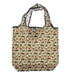 A reusable tote bag with a beige background and an all-over military-themed pattern featuring navy blue silhouettes of aircraft, ships, tanks, and soldiers, accented with small red circles and olive green details. The bag has dark navy blue trim and handles. - Image