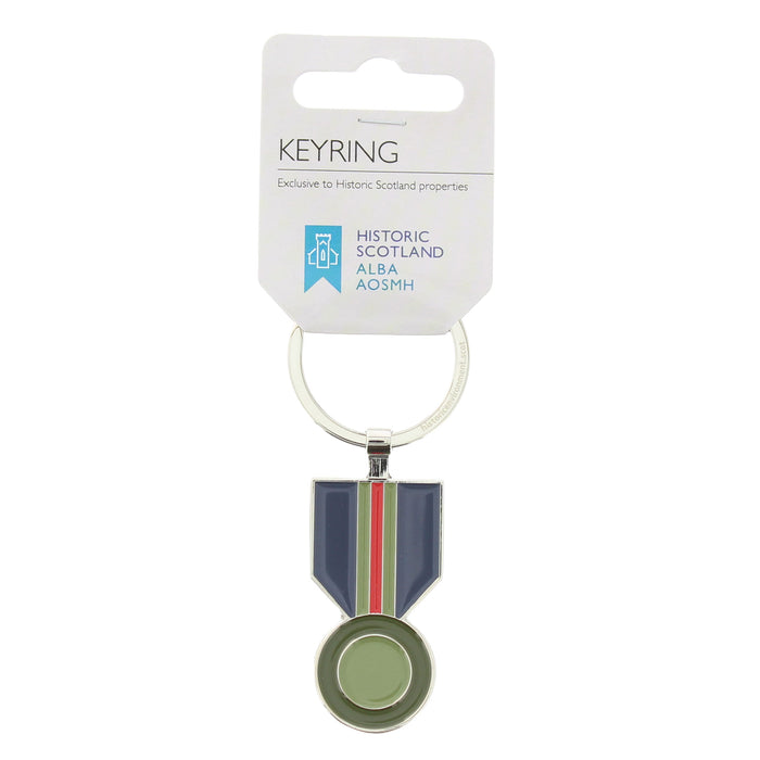 Medal design keyring on a white retail hanger card. The keyring features a silver-tone metal ring and a medal pendant with a navy blue ribbon, a red stripe, and a green center, set against a plain white background. - Image
