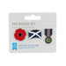 A three-piece pin badge set on a white card backing. The badges include a red poppy flower, the blue and white Scottish flag, and a navy, red and green medal. - Image