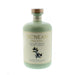 Mint green bottle of NcNean Whisky Liqueur against a white backdrop - Image