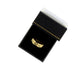 Gold ring in a black box on a white background - Image