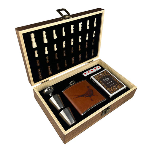 Open wooden gift box containing a pheasant printed flask, shot glasses, and game set items on a white background - Image