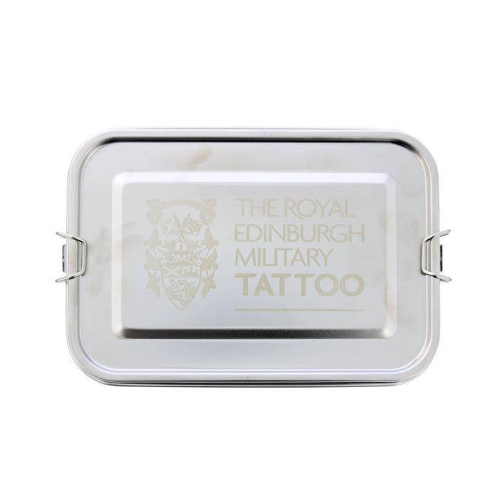 A rectangular metal tin with a hinged lid, featuring the text 'THE ROYAL EDINBURGH MILITARY TATTOO' and a crest printed in a light metallic colourway. - Image