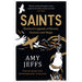 Black book cover for Saints featuring white doves, gold text and a depiction of a woman on fire. - Image