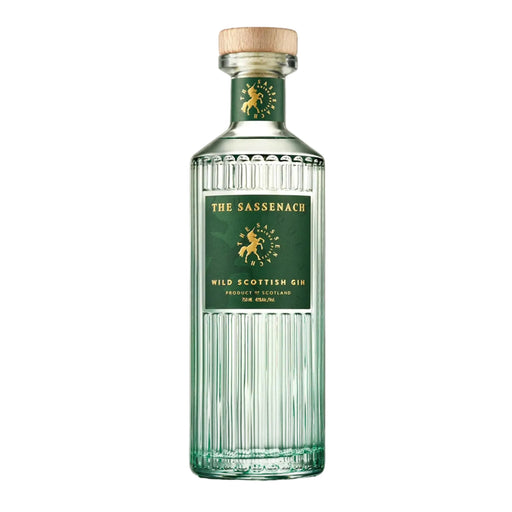 Clear bottle of Gin with a green label. Gold writing reads 'The Sassenach'.  - Image
