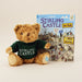 Teddy bear wearing a 'Stirling Castle' sweater with a book titled 'Stirling Castle for Kids' on a white background - Image