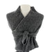 Gray knitted shawl on a mannequin against a white background - Image